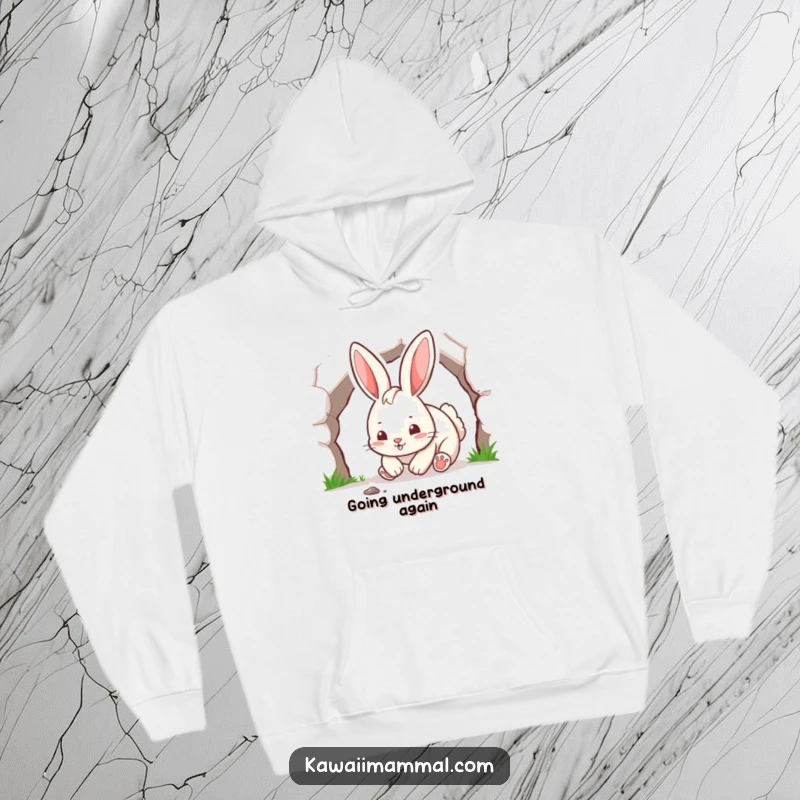 Funny rabbit character, paws deep in digging, wearing a cozy hoodie, radiating playful energy.