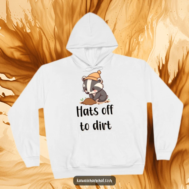 Funny hoodie featuring a curious badger in a tiny hat digging with great determination, perfect for cozy, humorous adventures.